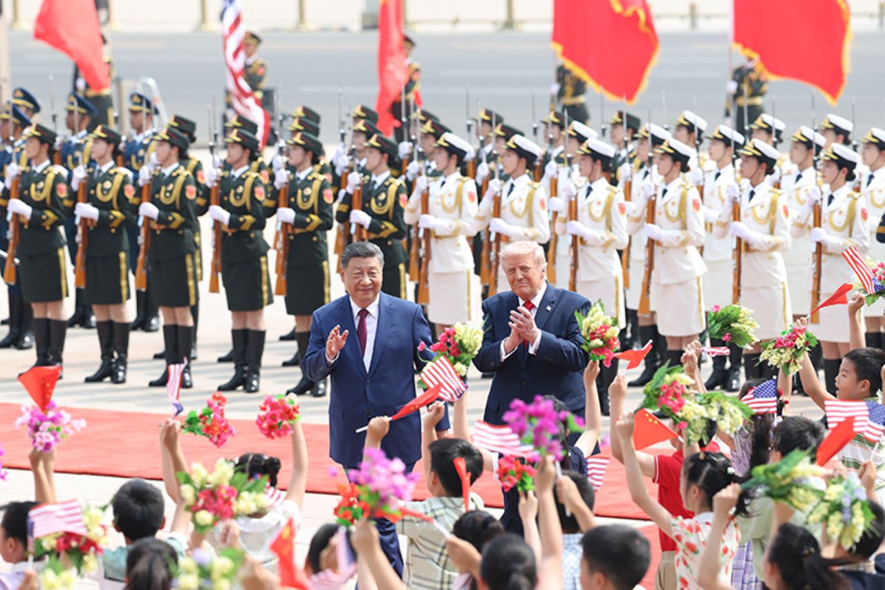 Presidents Xi and Trump at a welcoming ceremony for Trump at the East Gate Square outside the Great Hall of the People.